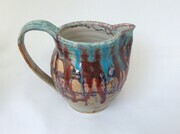Pitcher with turquoise blue