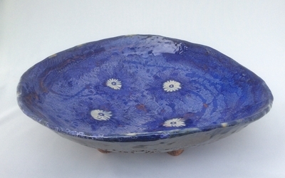 Offering bowl with white flowers