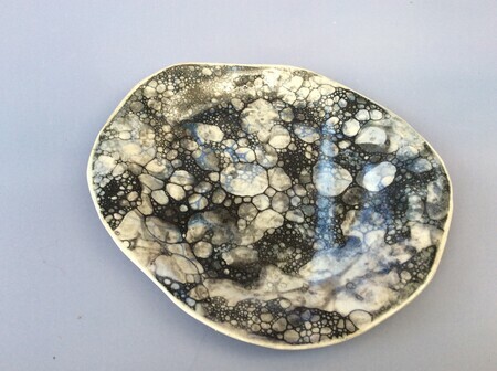 Small tapas/breakfast porcelain plate with black and white pattern